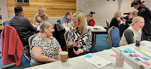 Local residents discuss the findings