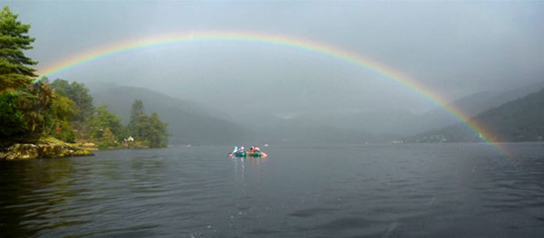 Photo of canoues on the loch