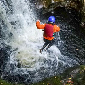 Photo of pupil leaping into waterfall