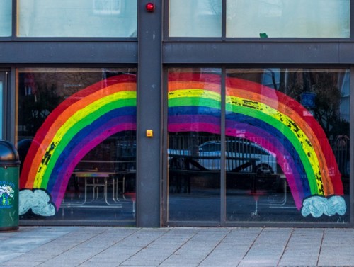 Rainbow painted across a school entrance